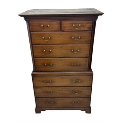 George III mahogany chest on chest, the upper section with two short over three long drawers with swan neck handles flanked by canted corners, inlaid with boxwood stringing below a dentil cornice. The lower section with three long drawers, supported on bracket feet 