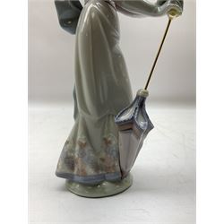 Two Lladro figures, comprising Garden Classic, no 7617 and Garden Song, no 7618, with original boxes and artists signature beneath, largest example H23cm