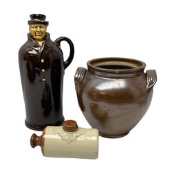 Stoneware decanter in the form of a rotund gentleman in hat and coat, together with a miniature stoneware hot water bottle and stoneware jar  