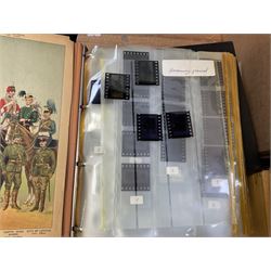 Large collection of slides of militaria interest to include examples of military uniforms and soldiers etc, housed in cases 