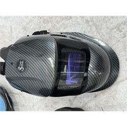 Evolution 110V circular saw and a Kimberley Clark welding mask