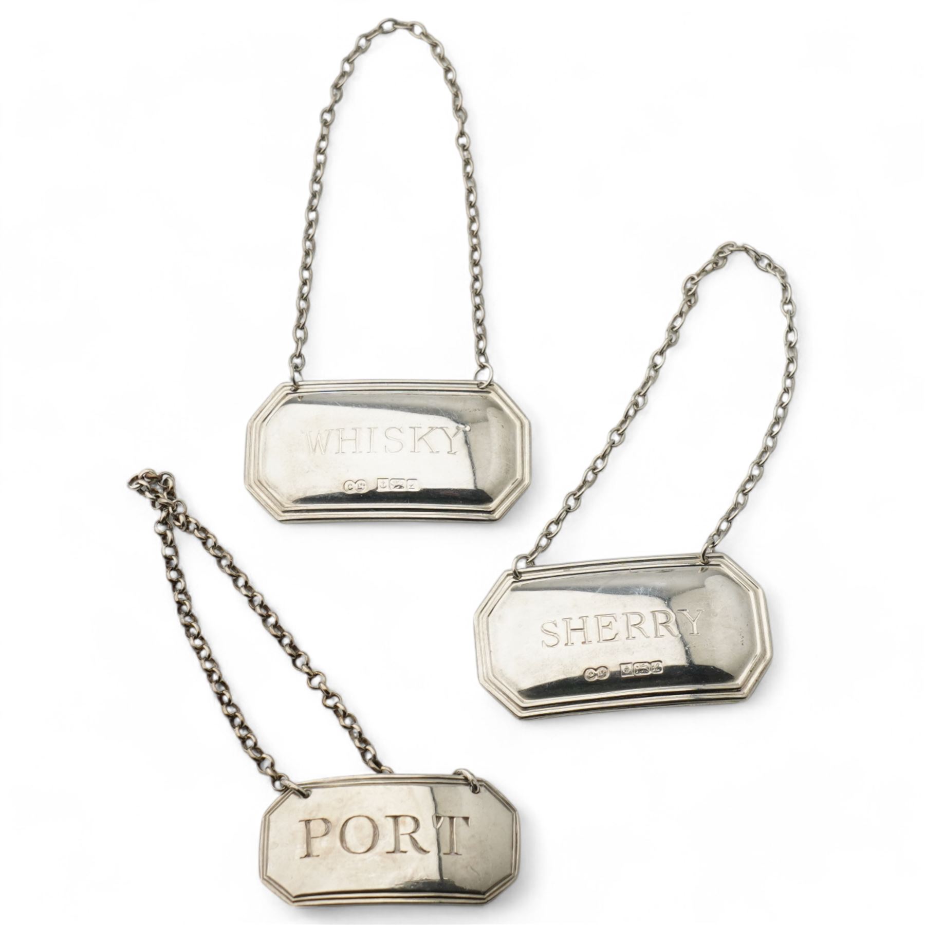 Edwardian silver miniature hay rake with ebonised handle L20cm Birmingham 1908 Maker T H Hazlewood & Co., pair of silver decanter labels 'Whisky' and 'Sherry' Birmingham 1985, another 'Port', silver vesta case and small silver dish D8cm