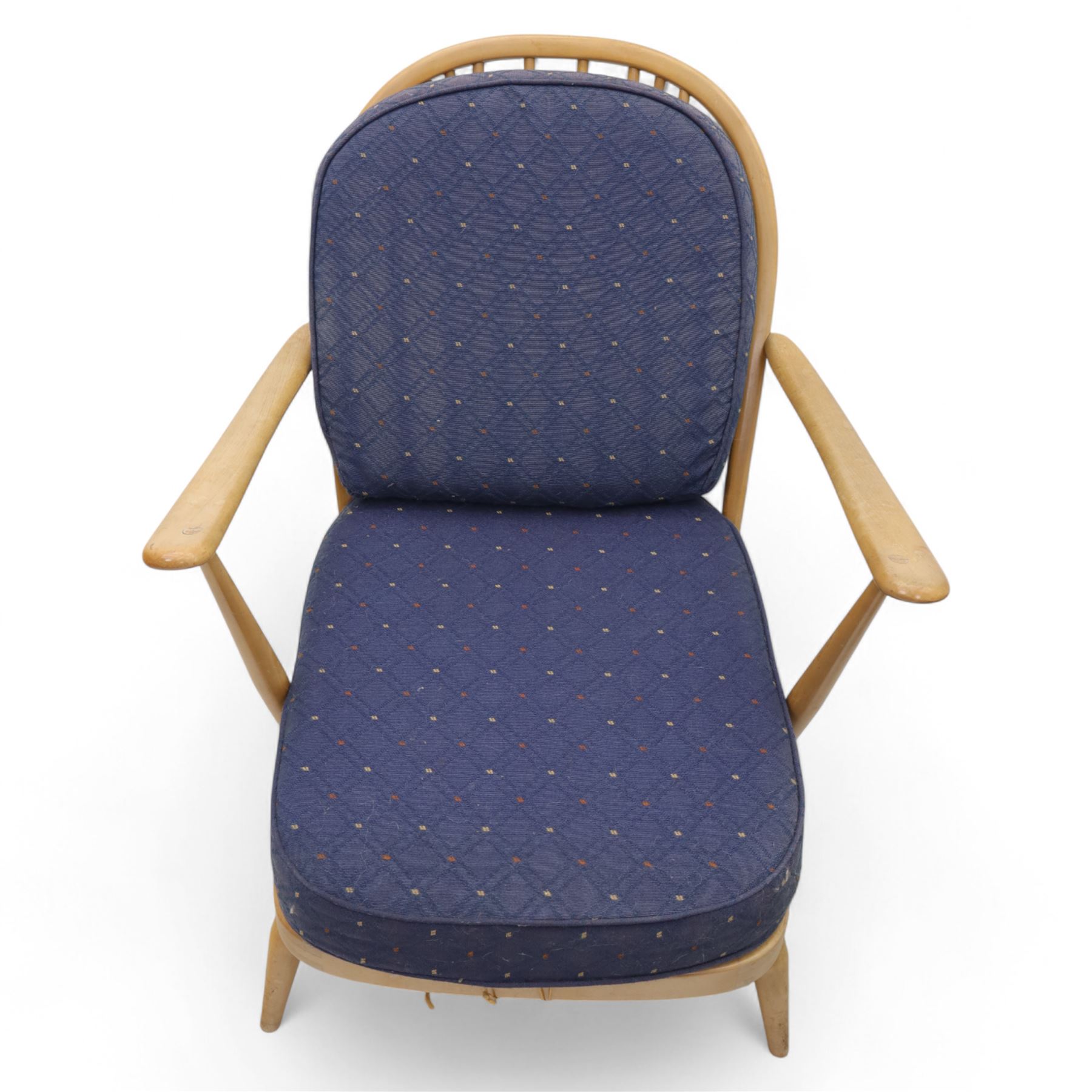 Ercol - Model '203', pair of easy chairs, with blue upholstered cushions and additional orange covers, with looped backrest and shaped spindles, outward swept arms, drop in seat frame