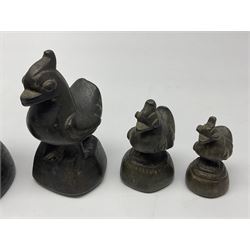 19th century graduating set of Burmese bronze opium weights, in the form of Hintha birds, tallest H11.5cm (8)