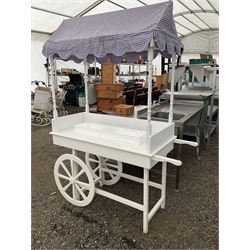 White painted display stand in the form of a cart  - THIS LOT IS TO BE COLLECTED BY APPOINTMENT FROM DUGGLEBY STORAGE, GREAT HILL, EASTFIELD, SCARBOROUGH, YO11 3TX