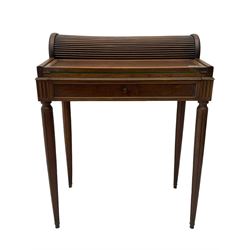 Early 20th century French plum pudding mahogany petite writing desk, barrel tambour roll top, fitted with a single cock-beaded drawer activating the tambour roll, the fold-over writing slope with inset writing surface supported by long drawer, fitted with three small drawers and pen rail, raised on fluted tapering supports