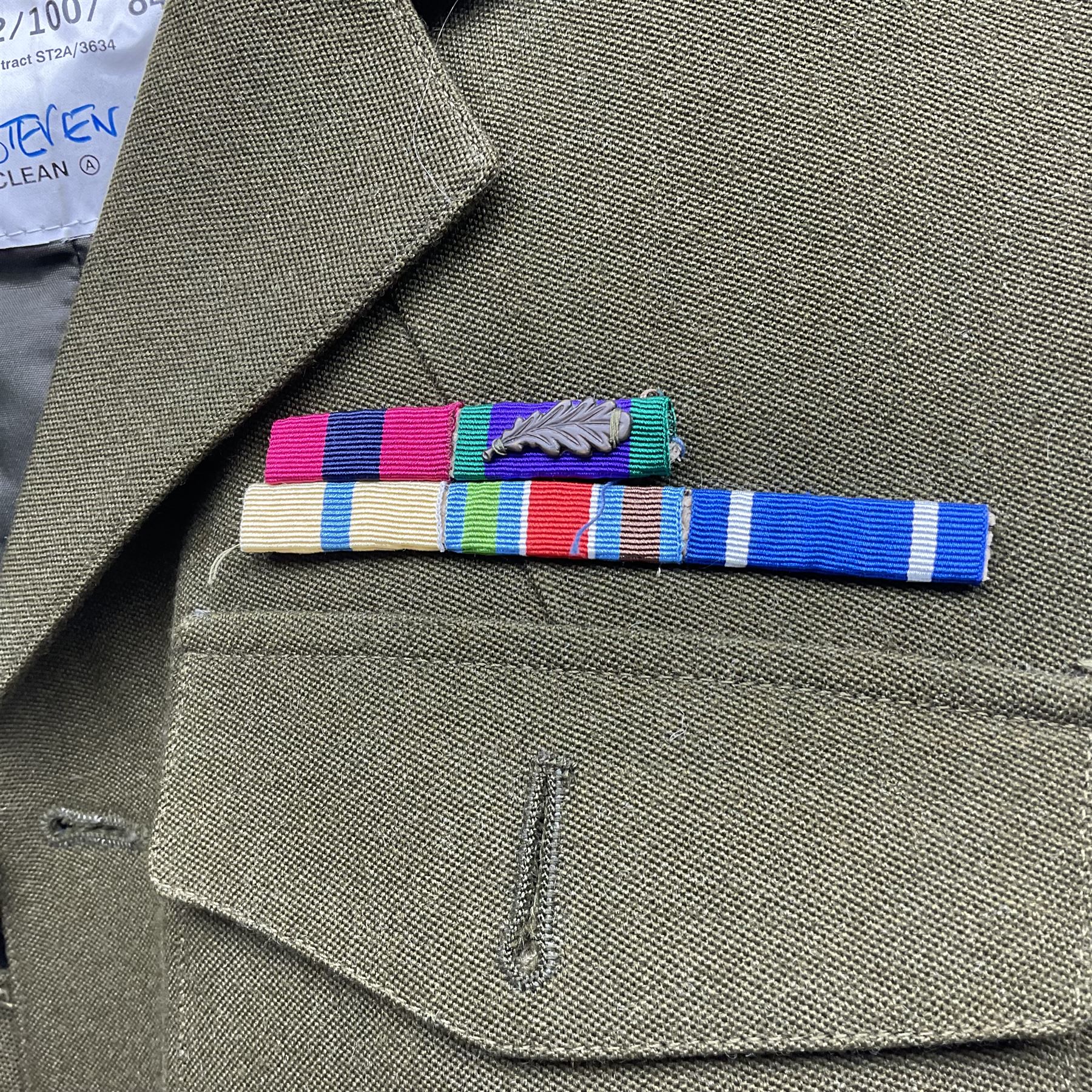 Two post-WWII British Army No.2 Dress tunics, one with Green Howards buttons; army shirt dated 1951; Royal Fleet Auxilliary jacket with trousers; three RAF/WAAF uniforms and RAF Greatcoat; and three canvas/webbing bags, two dated 1943 & 1945