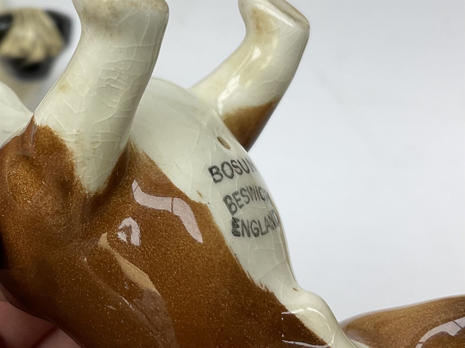 Beswick figures to include, english setter 'Bayldone Baronet', model no 973, collie, model no 1791, sheepdog, model no 1792, black labrador, model no 1548, Irish red setter, model no 966, Connoisseur Beagle on a wooden plinth 1933B, frog in cream matt, model no 368, etc 