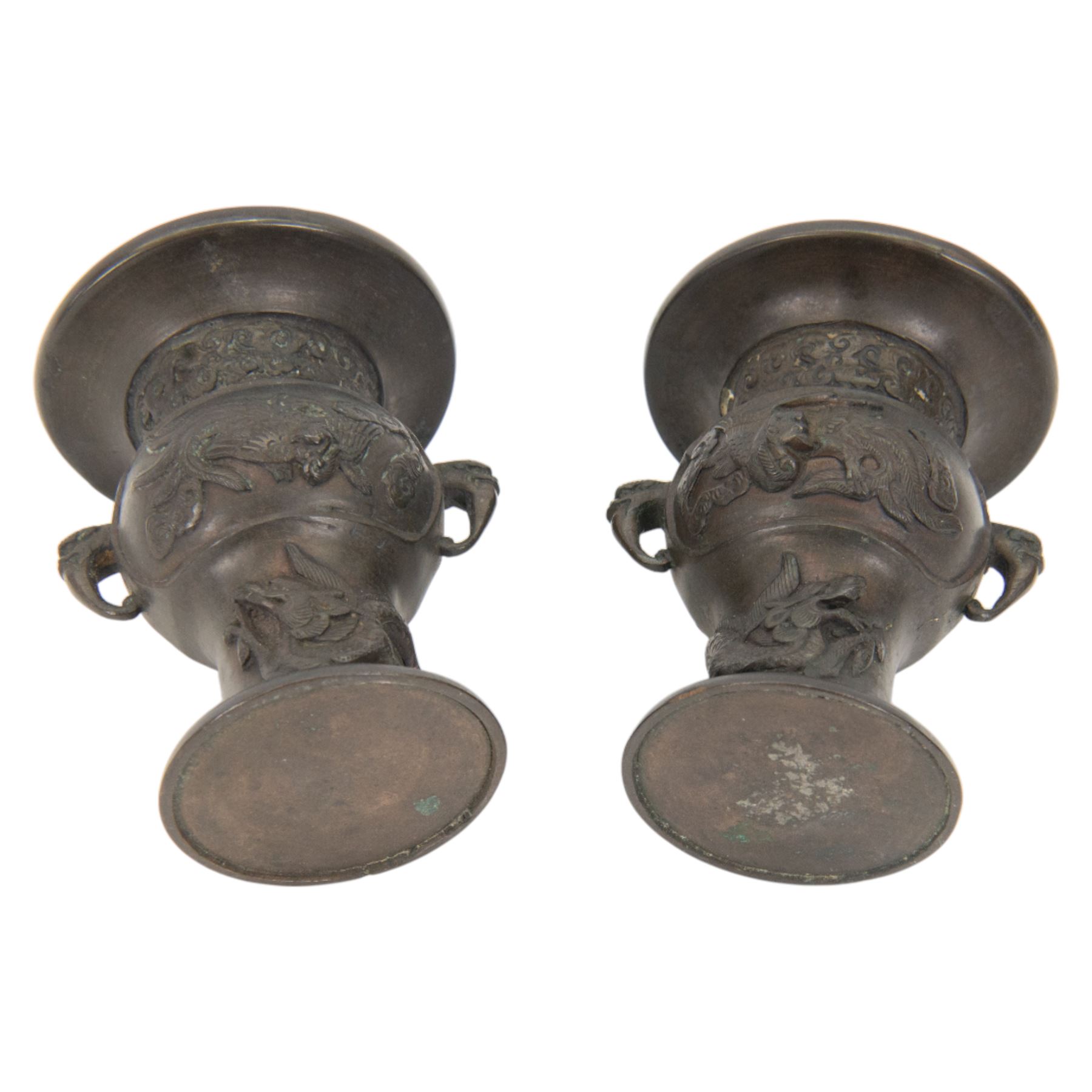 Pair of Japanese bronzed vases, decorated in relief with with birds and dragons, with dragon head handles, H13cm
