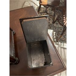 Early 19th century rosewood and brass inlaid tea caddy, of sarcophagus form, the front and hinged opening cover inlaid with brass scrolling panels, opening to reveal a compartmented interior with twin removable boxes with conforming inlaid brass detail to the hinged covers and zinc lining to the interiors, flanking a later glass mixing bowl, the whole upon four turned cylindrical feet, H21cm W36cm D20cm