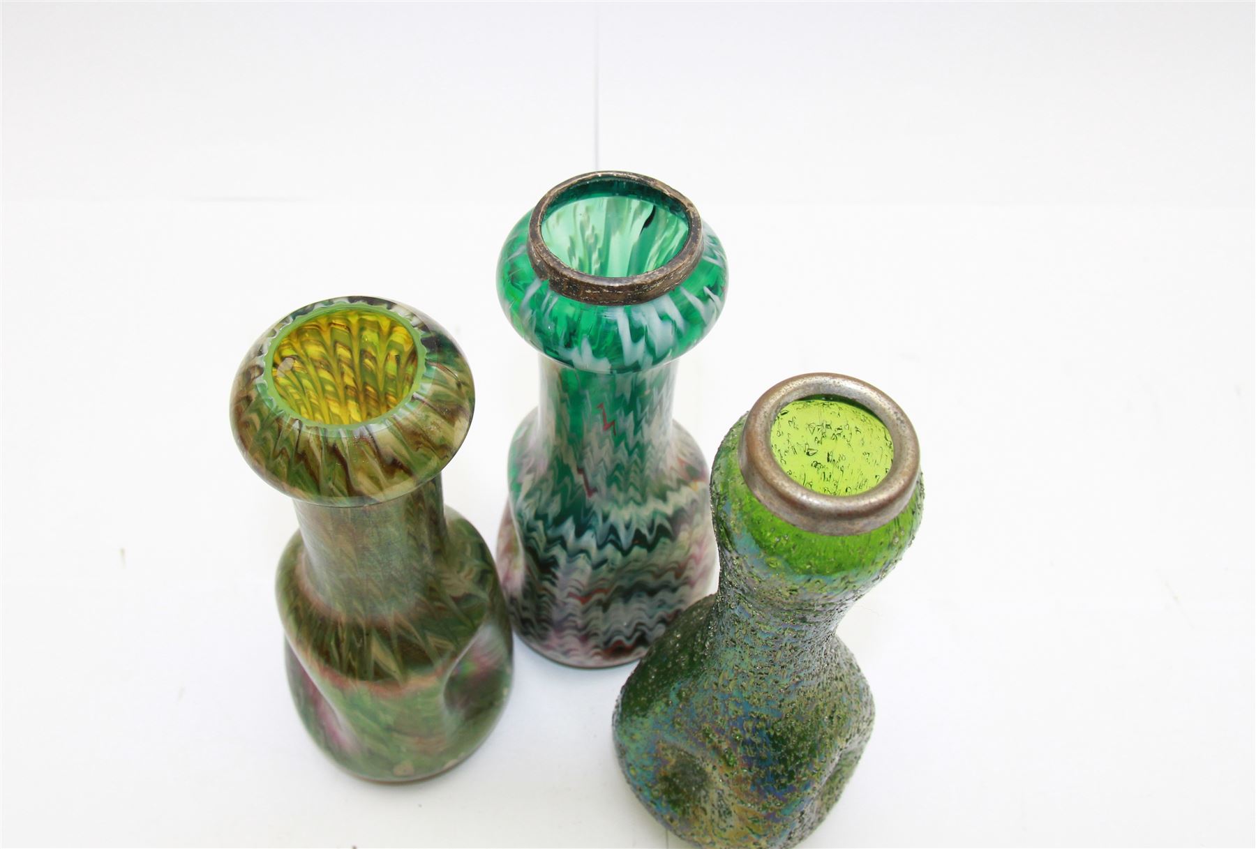 Three Austrian Art Nouveau green iridescent glass bottleneck vases, probably Rindskopf, to include one example with hallmarked silver collar, tallest H18cm (3)