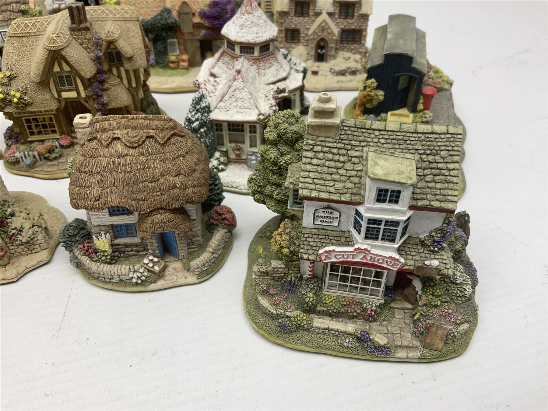 Twenty Lilliput Lanes, including The Right Note, Chatterbox Corner, Whistle Stop Gate, New Neighbours, Travellers Rest etc, all in original boxes