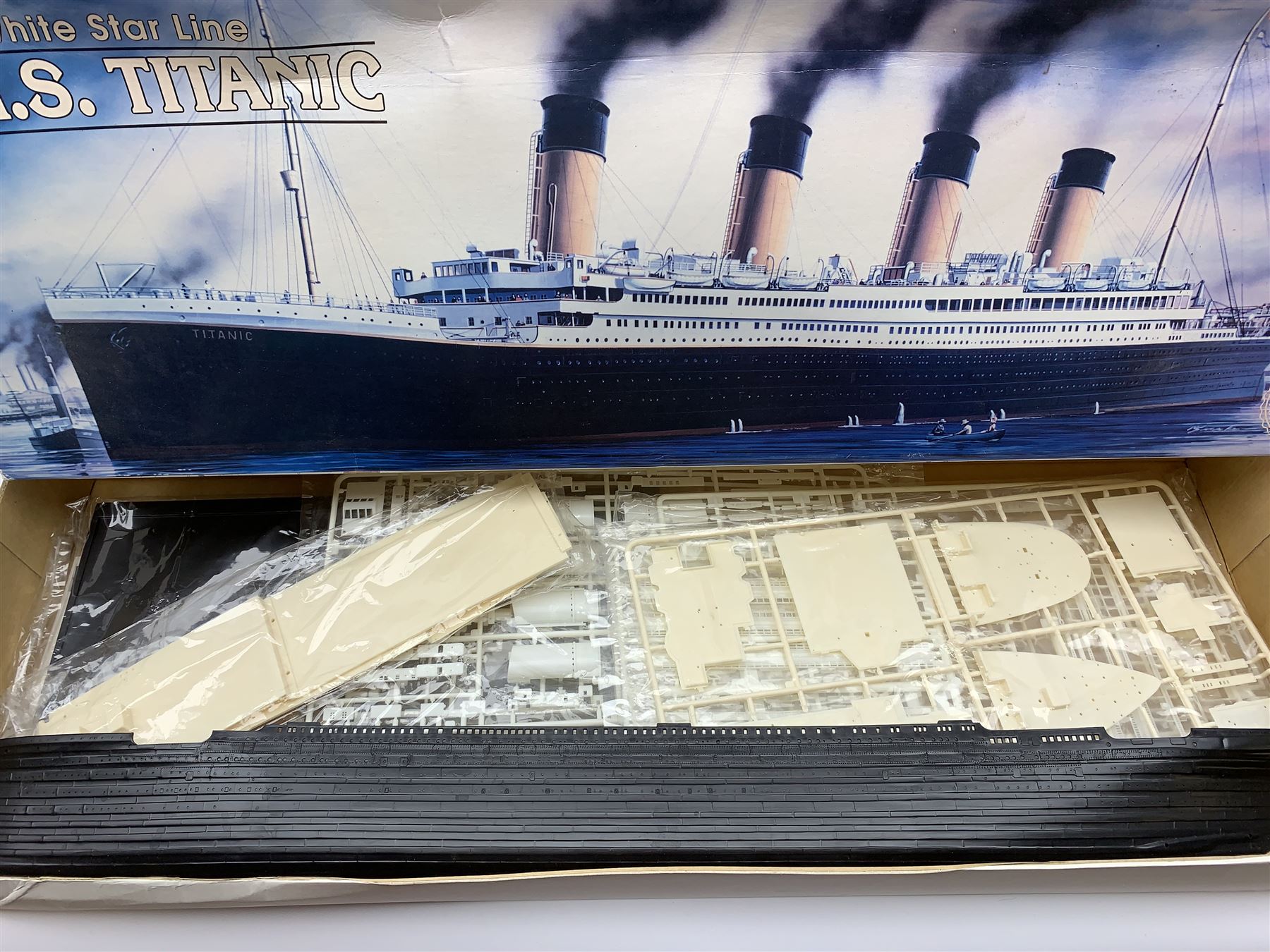 Airfix 1/350th scale model kit of HMS Illustrious, in factory sealed box; Airfix 1/72nd scale model kit of RNLI Severn Class Lifeboat with RAF Westland Sea King Helicopter; and Minicraft Model Kits 1/350th scale model of R.M.S. Titanic; both in factory sealed transparent packaging in boxes (3)