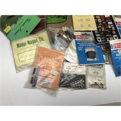 '00' gauge layout accessories - Langley Miniatures Footbridge kit, wagon kits by Nu-Cast, Colin Ashby, Slaters etc, layout chippings, fencing, sprues of figures and accessories, switches and motors, Peco Lectrics, name plates, transfers etc; most boxed or packaged