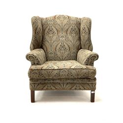 Georgian style wing back sprung armchair