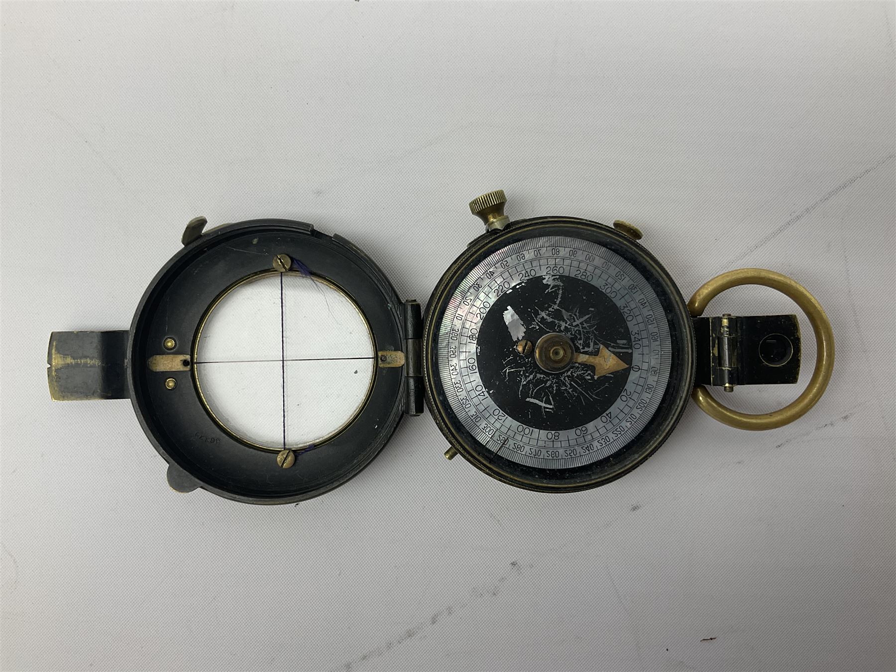 WW1 verner's pattern brass cased marching compass inscribed F-L No.74469 1917; in leather carrying case impressed W. Huddlestone Leatheries Ltd. 1917