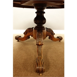  Victorian figured walnut tilt top breakfast table, circular top with ebonised moulded edge, profusely inlaid with trailing foliage and flower heads, segmented veneers each with musical themes enclosed by scrolls, putti motifs to centre within in reeds, on acanthus leaf baluster column and three splayed legs, D149cm, H78cm  