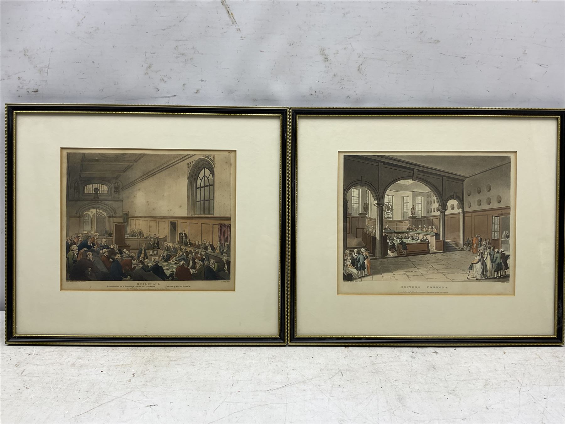 Charles Augustus Pugin (British 1762-1832) and Thomas Rowlandson (British 1757-1827): 'Guildhall' and 'Doctors Commons', pair early 19th century hand-coloured lithographs 22cm x 27cm
