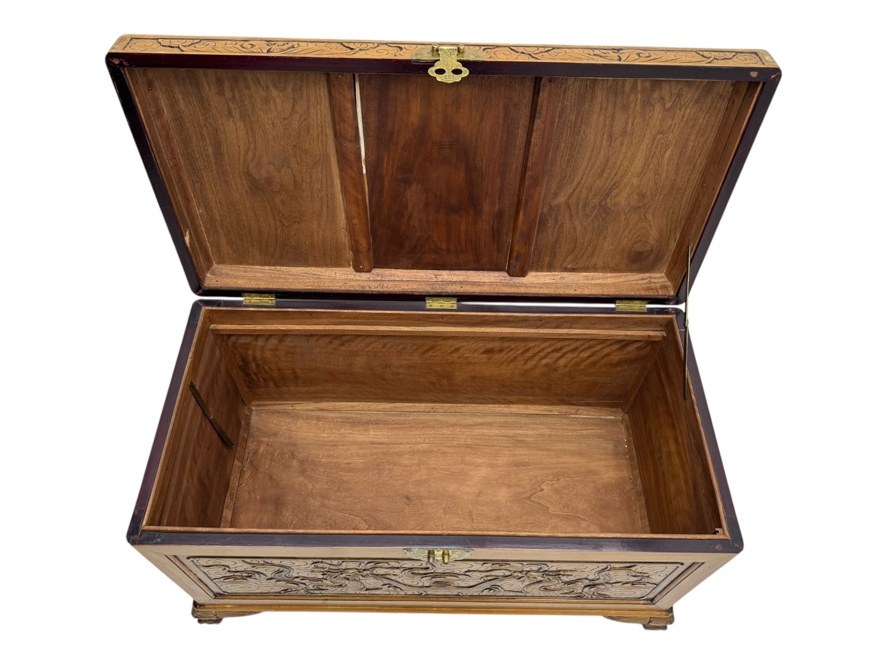 Chinese camphorwood blanket chest with stylized dragon carved decorated lid