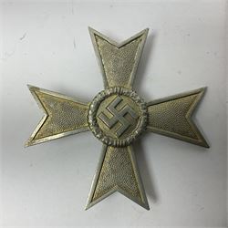 German War Merit Cross 1st Class, the pin-back stamped '50'; War Merit Medal; and Ostfront Medal for the Winter Campaign in Russia of 1941-1942 'Die Medaille Winterschlacht Im Osten'; all with ribbons (3)