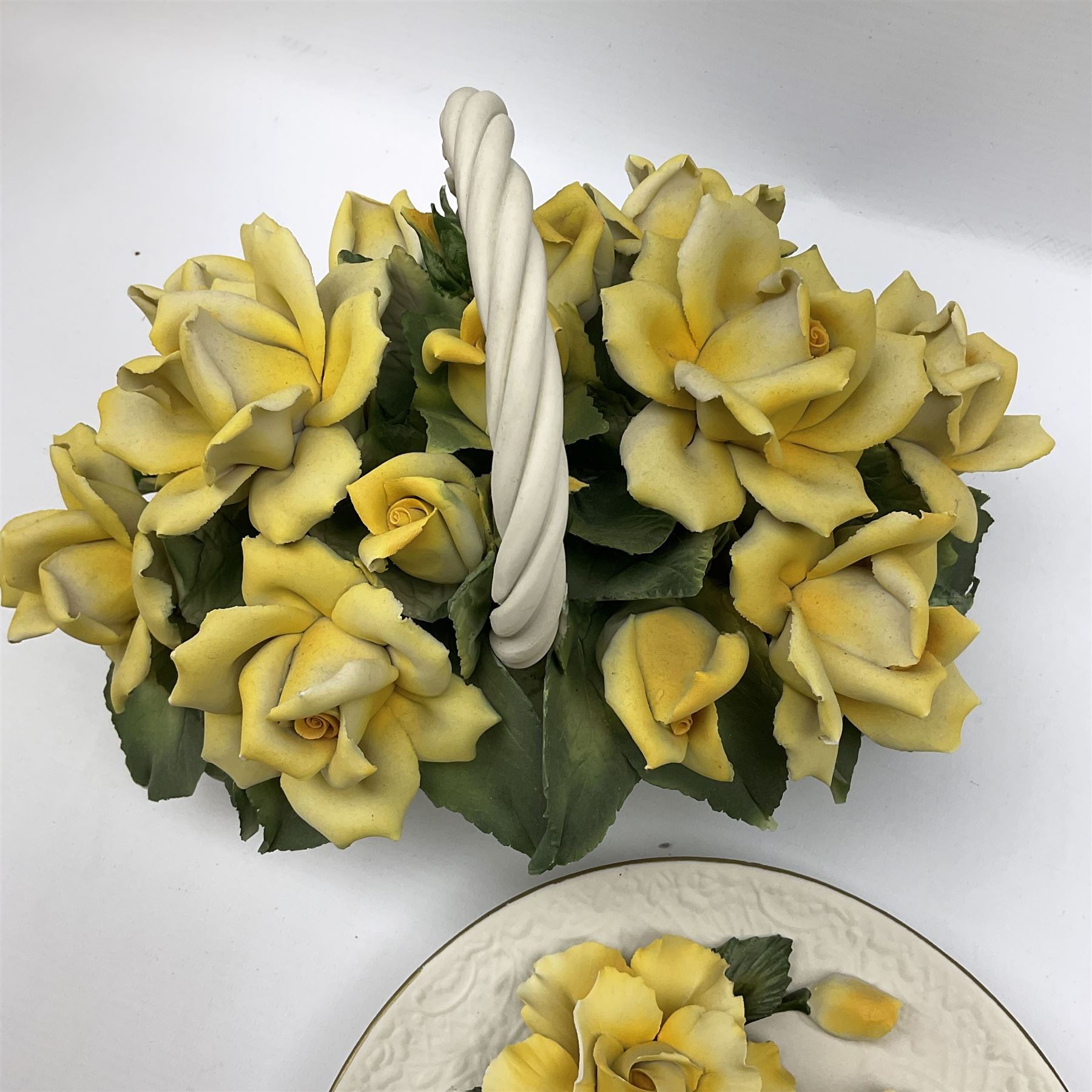 Franklin Mint The Yellow Roses of Capodimonte collectors plate, together with a Italian floral encrusted ornament modelled as a basket of yellow roses