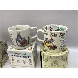 Royal Doulton Bunnykins nursery set in box and two cups, together with two Wedgwood Peter Rabbit mugs and Royal Staffordshire Noddy money box and cup (7)