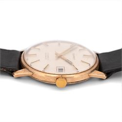 Summit gentleman's 9ct gold manual wind wristwatch, silvered dial with baton hour markers and date aperture, London 1974, on black leather strap