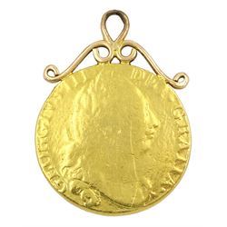 George III gold guinea coin, with soldered gold mount