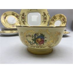 Aynsley tea service for six, decorated with floral sprays in ornate gilt detailing on cream ground, comprising six teacups and saucers, open sucrier and milk jug and cake plate, all with printed marks beneath