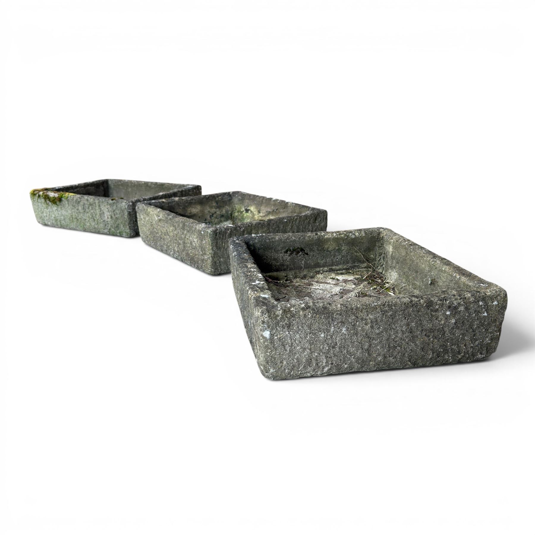 Three weathered composite stone rectangular planters, shallow form