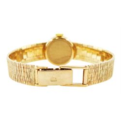 Tissot ladies 9ct gold manual wind wristwatch, silvered dial with baton hour markers, London 1973, on integral 9ct gold bracelet