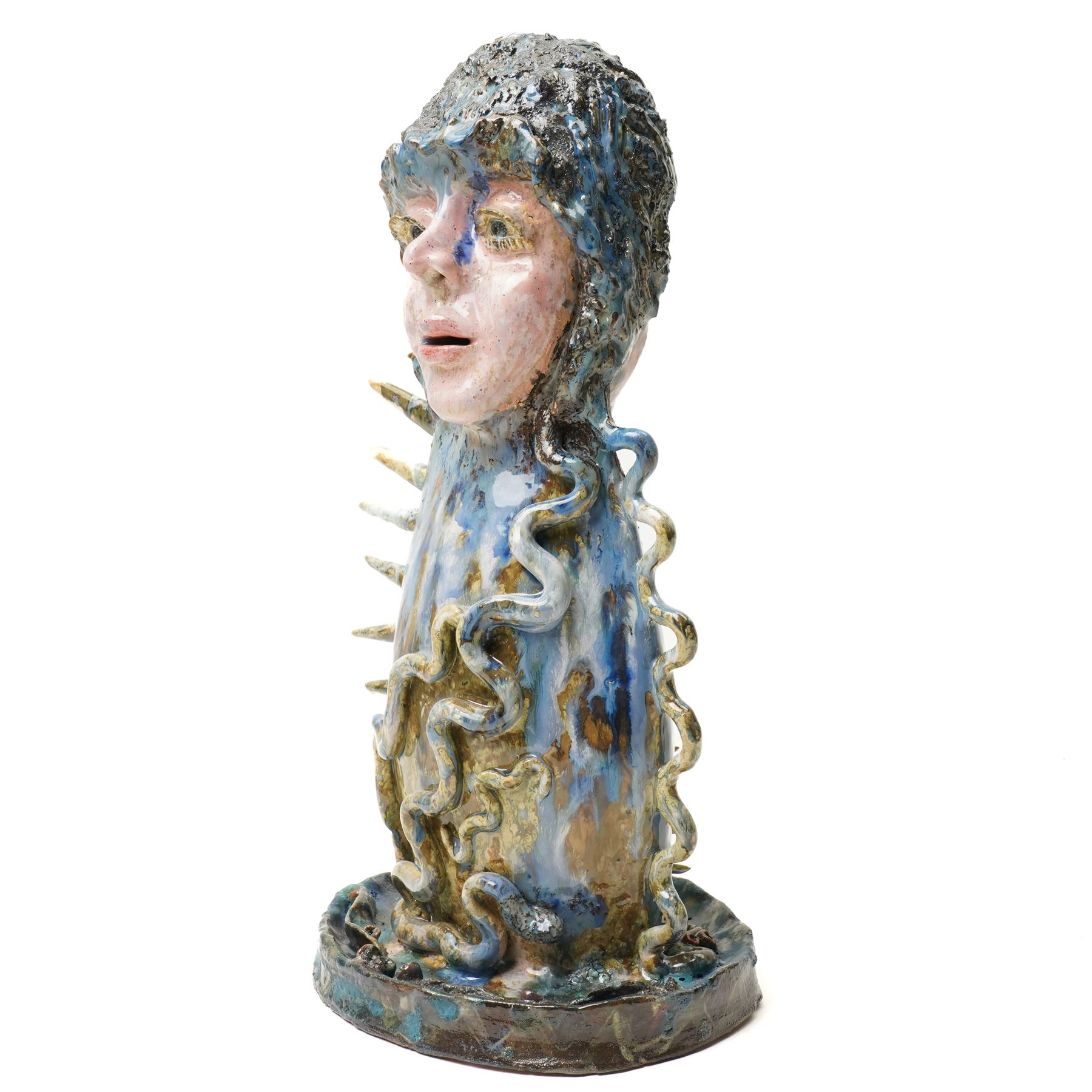 Galea Belinscaia (Yorkshire Contemporary): 'The Mermaid', two faced blue and green glazed figurative sculpture, H42cm 
Notes: Awarded second prize in the 2019 Bradford Open exhibition and Art Competition judged by John Loker and Caroline Douglas. The sculpture was complimented for its tremendous presence, with the judges noting that Belinscaia's work is 'witty, inventive and wonderfully dynamic.'