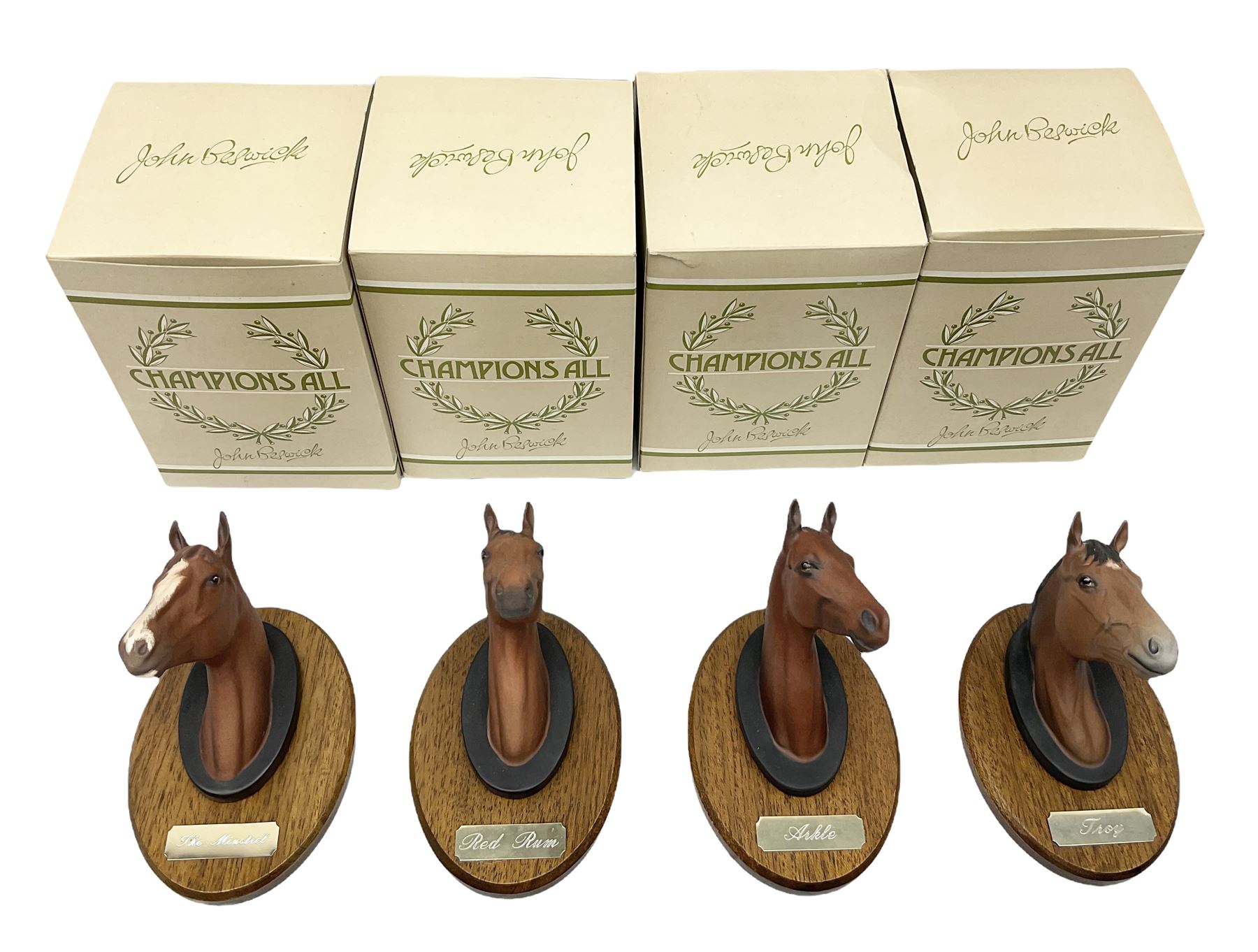Beswick set of horse head wall plaques 'Champions all', comprising Arkle no.2700, The Minstrel no.2701, Red Rum no.2702, Troy no.2699, all with original boxes