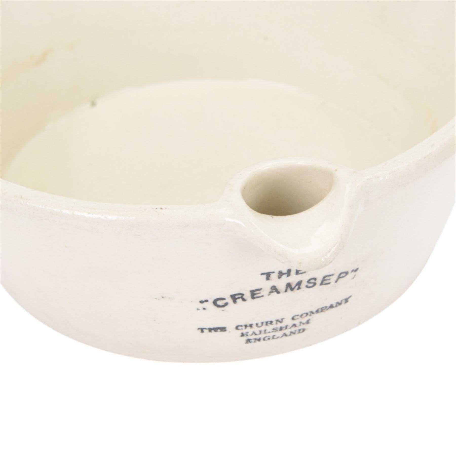 Cream separating bowl 'The Creamsep' and two glass bottles, one impressed 'T Laughton Scarborough', the other 'Genuine Superior Aerated Waters J Bordass Driffield', bowl D27.5cm
