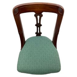 Set of four Victorian mahogany spoon back dining chairs, upholstered seats