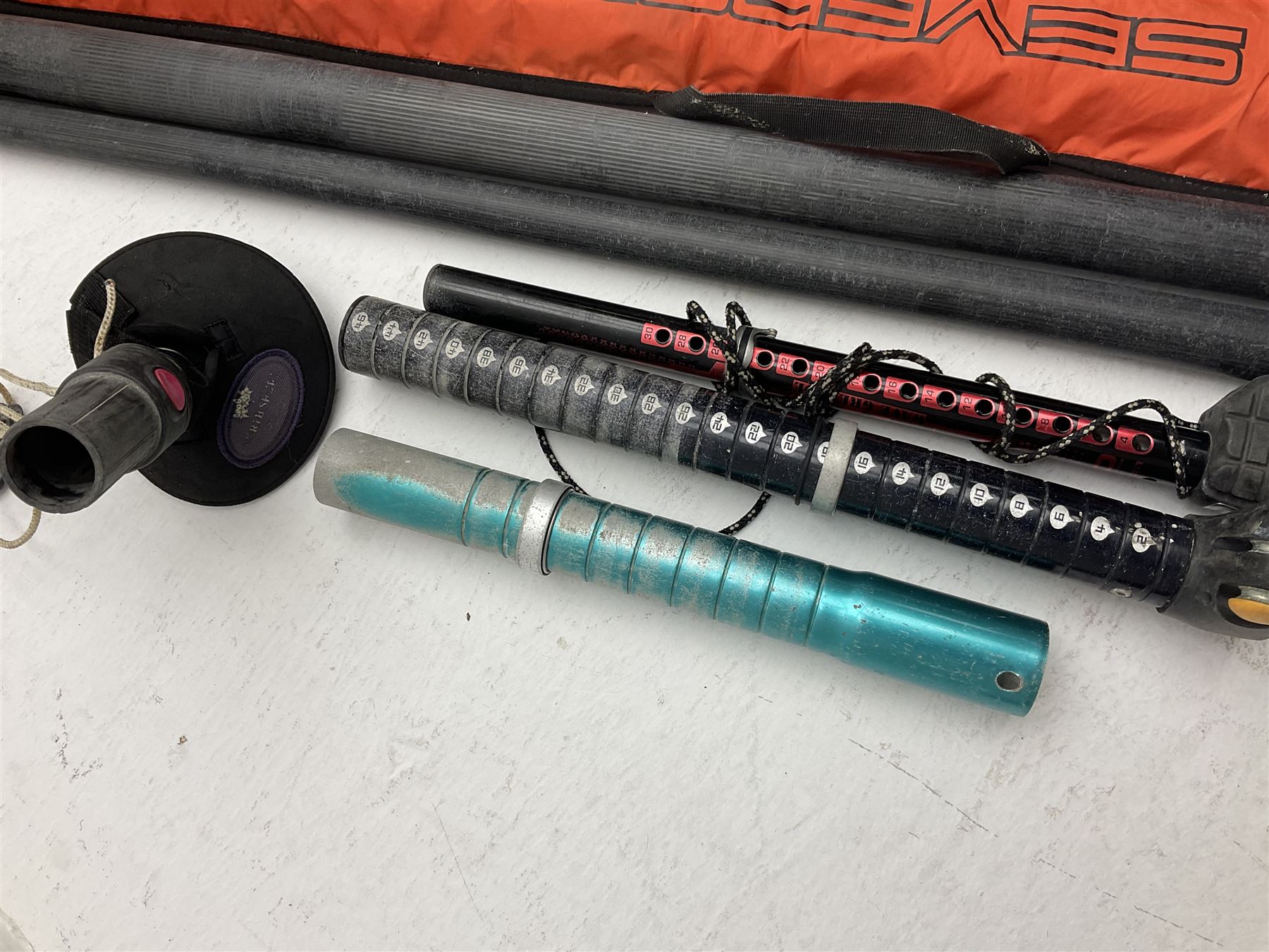 Windsurfing: Quantity of sails and masts comprising Severne Gator sail, mast 430/21 size 6.0, luff 453, boom 182, carbon Redline Severne 430 RDM mast, Tushingham Rock sail and Tushingham Free Wave mast, Tunshingham The Rock 4.2 sail, some with carrying cases, together with other equipment to include Severne Wave Grenade extension, other extensions etc