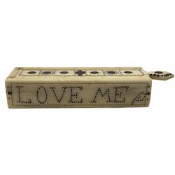 Small rectangular Scrimshaw box containing twenty three miniature Whale Bone dominoes, sliding top decorated with roundels, the sides inscribed, 'Love Me' L9cm, W2.25cm, H1.75cm