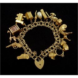 Gold link bracelet with heart locket and fifteen 9ct gold charms including train, car, gun, money box, rabbit and rocking horse and one 14ct gold charm all hallmarked or stamped, approx 37gm