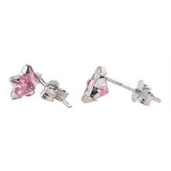 Pair of 9ct white gold purple stone star stud earrings, stamped 