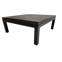 Modern square coffee table, leather top raised on black painted square supports