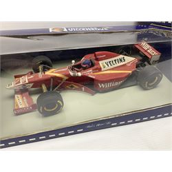 Four Paul's Model Art 1:18 scale die-cast racing cars - Jacques Villeneuve Williams Mecachrome Launch Version 1998 and Williams Renault FW19; Ralf Schumacher Jordan Peugeot 197; and Michael Schumacher Benetton Renault B195 World Champion 1995; all boxed (4)