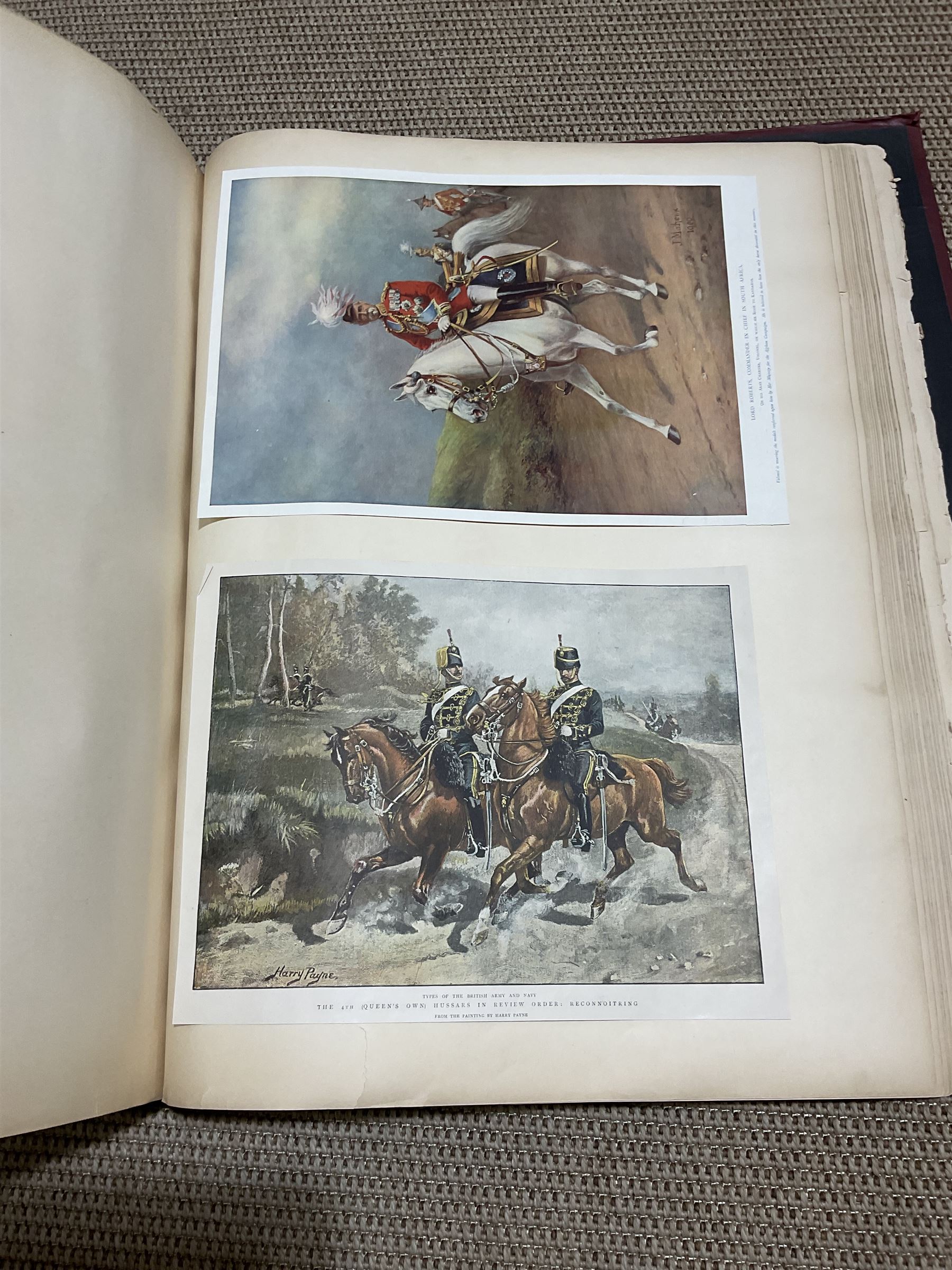 Large album of 19th century and later engravings and prints, mostly military, stuck down, album 49cm x 62cm overall