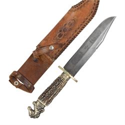 Fred W James Sheffield bowie knife, the 24cm blade engraved 'The United States the Land of the Free and the Home of the Brave..', stag handle, pommel in the form of a horse's head, with leather sheath, L42cm
The pommel motif is a classic bowie fitting, the book Tweedale, G: The Sheffield Knife book has an illustrated example on p87