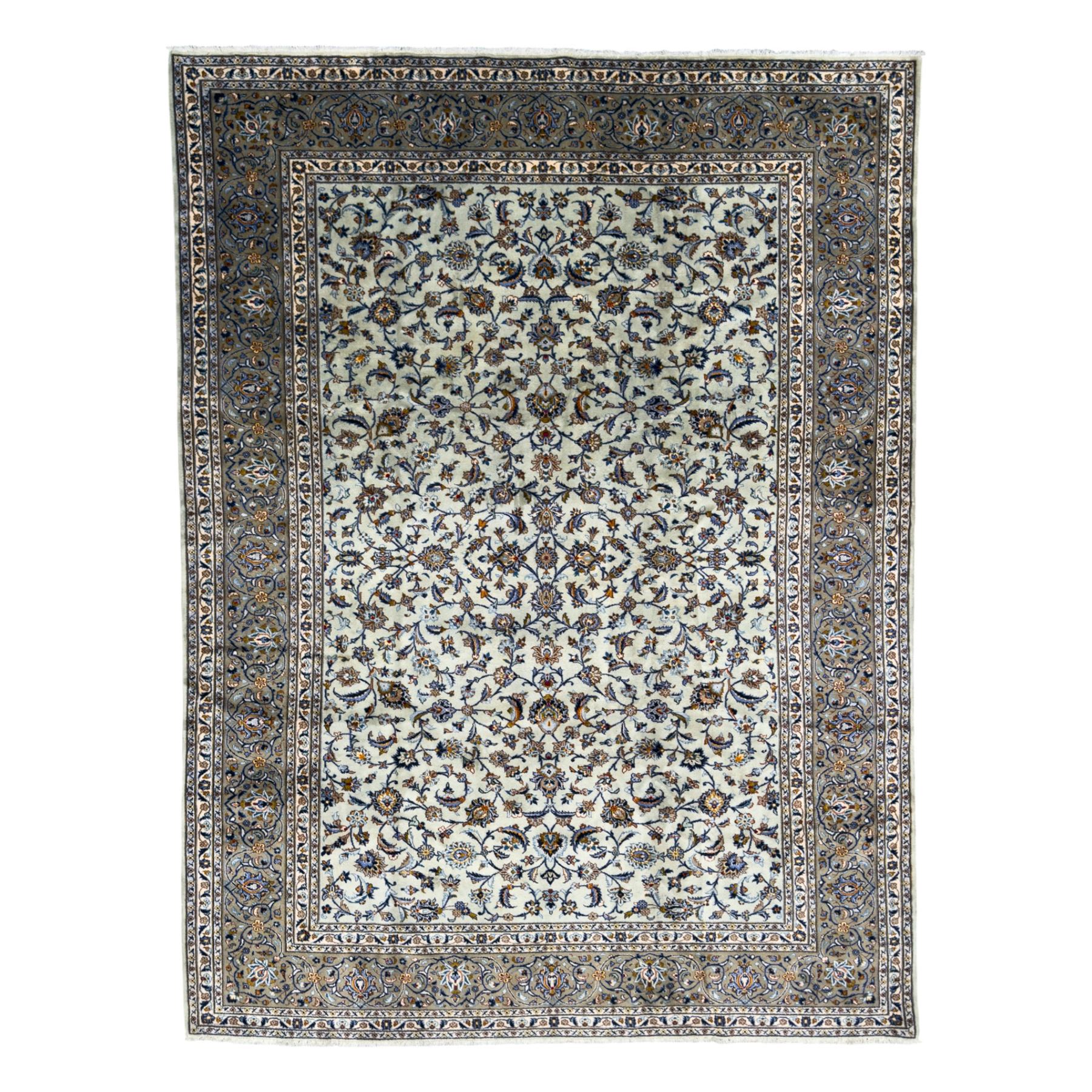 Central Persian Kashan hand-knotted carpet, the ivory ground intricately decorated with scrolling vines, palmettes, and stylised flowerheads in soft blue, gold and brown tones, enclosed by a broad indigo border with repeating floral motifs and multiple guard stripes
