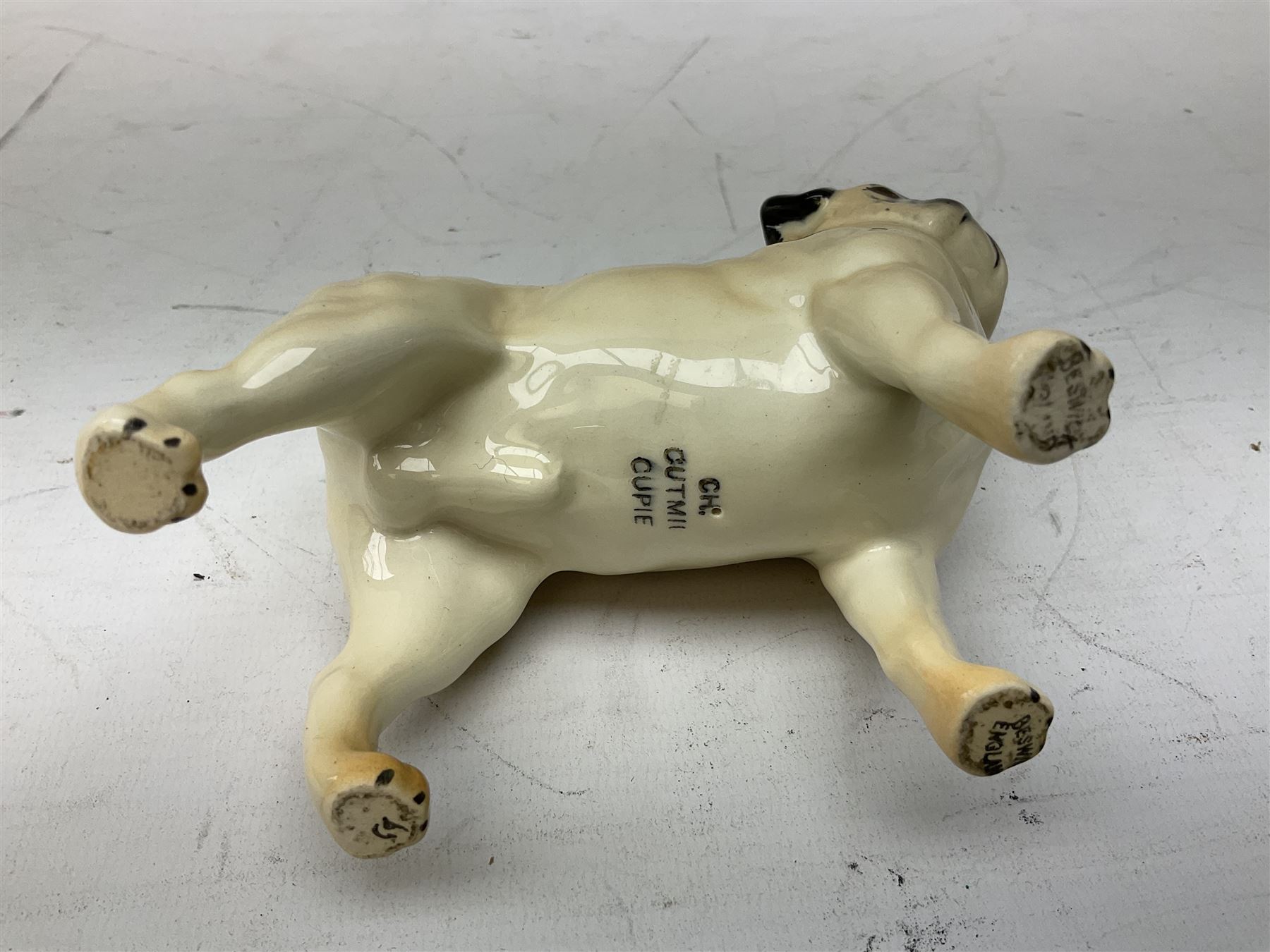 Three Beswick models comprising Hereford Bull no 949, 'CH Cutmil Cupie' Pug, and bay Shire horse, all with printed marks beneath