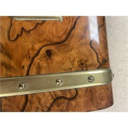 19th century walnut and brass bound games compendium box, painted to enhance the grain, of rectangular form, the hinged opening cover with rounded sides, central brass cartouche with engraved lion crest, and brass riveted straps, opening to reveal a red leather and blue silk lined compartmented interior, with fold-down games board, and lift-out tray containing playing cards, ebony turned dice towers, white and red stained bone draughts, and chess pieces, ivory dice, and ivory and ebony whist markers, and brass bezique board, cribbage board and markers, H15cm W32cm D24cm
This lot has been registered for sale under Section 10 of the APHA Ivory Act