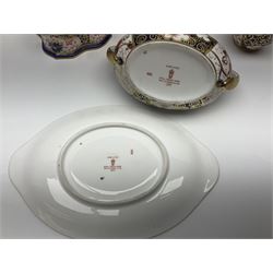 Collection of Royal Crown Derby Imari pattern, comprising covered trinket box, twin handled sucrier and saucer, oval dish and vase, all with printed marks beneath  