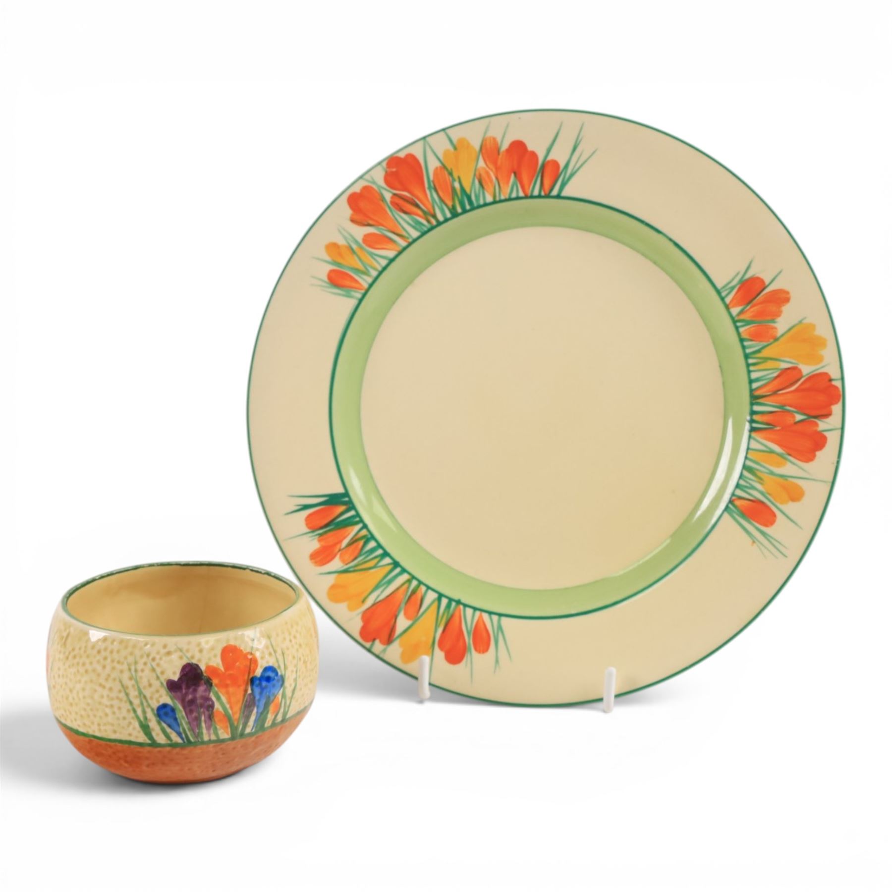 Clarice Cliff Sungleam Crocus pattern plate, together with Crocus pattern preserve jar, both with printed marks beneath, plate D23cm 