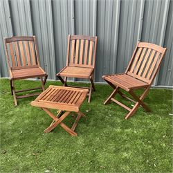 Cotswold Collection - three teak folding garden chairs and foldable table  - THIS LOT IS TO BE COLLECTED BY APPOINTMENT FROM DUGGLEBY STORAGE, GREAT HILL, EASTFIELD, SCARBOROUGH, YO11 3TX