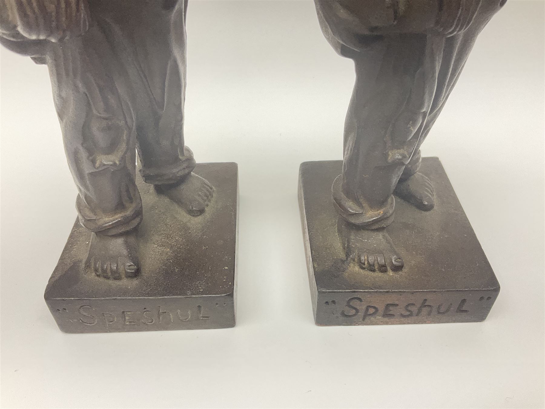 Pair of cast iron Qualcast advertising figures of news boys marked 'Speshul',  H18cm